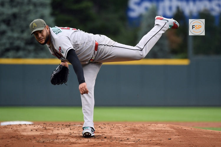 May 16, 2026; Denver, Colorado, USA; Arizona Diamondbacks pitcher Eduardo Rodriguez (57) pitches in the first inning against the Colorado Rockies at Coors Field. Credit: Christopher Hanewinckel-Imagn Images