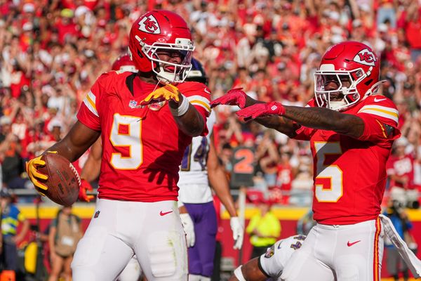Sep 28, 2025; Kansas City, Missouri, USA; Kansas City Chiefs wide receiver Juju Smith-Schuster (9) celebrates with wide receiver Marquise Brown (5) against the Baltimore Ravens after scoring during the game at GEHA Field at Arrowhead Stadium. Mandatory Credit: Denny Medley-Imagn Images