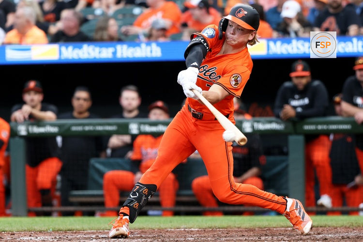 Apr 19, 2025; Baltimore, Maryland, USA; Baltimore Orioles second baseman Jackson Holliday (7) hits a single during the seventh inning against the Cincinnati Reds at Oriole Park at Camden Yards. Credit: Daniel Kucin Jr.-Imagn Images