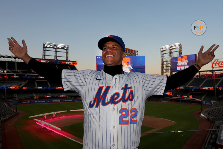 Dec 12, 2024; Flushing, NY, USA; New York Mets right fielder Juan Soto poses for photos during his introductory press conference at Citi Field. Credit: Brad Penner-Imagn Images