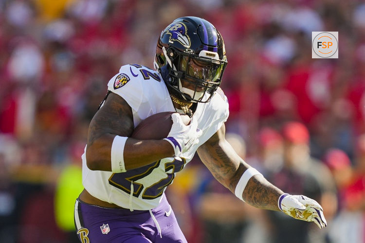 Sep 28, 2025; Kansas City, Missouri, USA; Baltimore Ravens running back Derrick Henry (22) runs the ball during the first half against the Kansas City Chiefs at GEHA Field at Arrowhead Stadium. Credit: Jay Biggerstaff-Imagn Images