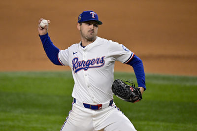 Apr 15, 2025; Arlington, Texas, USA; Texas Rangers starting pitcher Tyler Mahle pitches against the Los Angeles Angels during the fifth inning at Globe Life Field. All MLB players will be wearing the number 42 on Jackie Robinson Day to commemorate Robinson making his major league debut in 1947. Mandatory Credit: Jerome Miron-Imagn Images