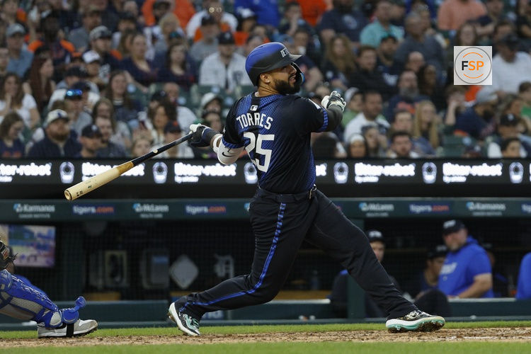 Apr 18, 2025; Detroit, Michigan, USA; Detroit Tigers second baseman Gleyber Torres (25) hits a single in the fourth inning against the Kansas City Royals at Comerica Park. Credit: Brian Bradshaw Sevald-Imagn Images