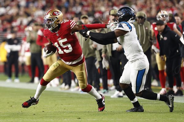 Nov 24, 2025; Santa Clara, California, USA; San Francisco 49ers wide receiver Jauan Jennings (15) makes a catch against Carolina Panthers cornerback Mike Jackson (2) during the second half at Levi's Stadium. Mandatory Credit: Kelley L Cox-Imagn Images