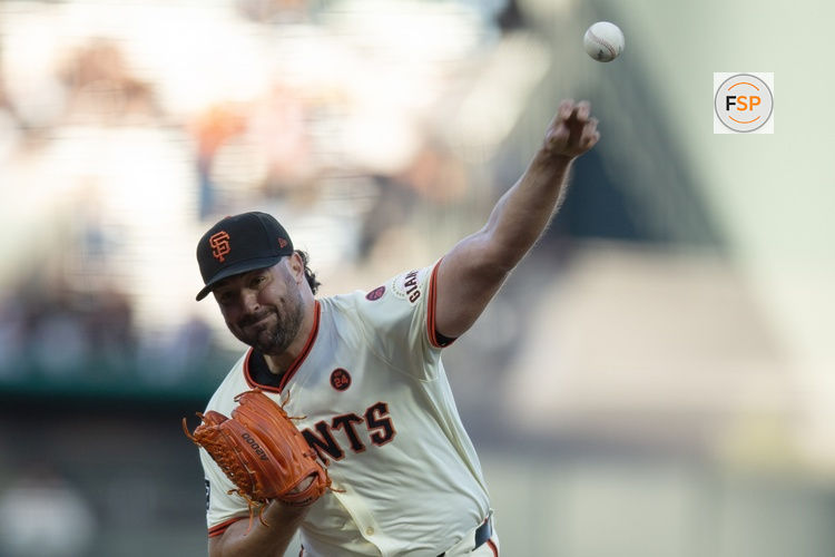Aug 14, 2024; San Francisco, California, USA; San Francisco Giants starting pitcher Robbie Ray (23) delivers a pitch against the Atlanta Braves during the first inning at Oracle Park. Credit: D. Ross Cameron-USA TODAY Sports