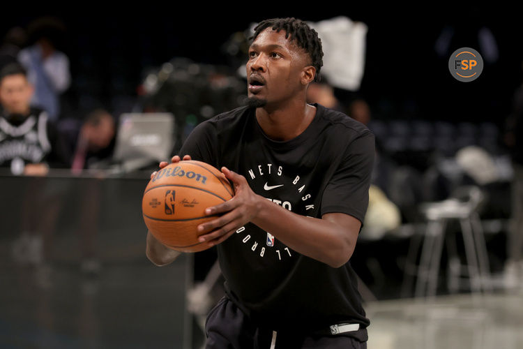 Nov 19, 2024; Brooklyn, New York, USA; Brooklyn Nets forward Dorian Finney-Smith (28) warms up before a game against the Charlotte Hornets at Barclays Center. Credit: Brad Penner-Imagn Images