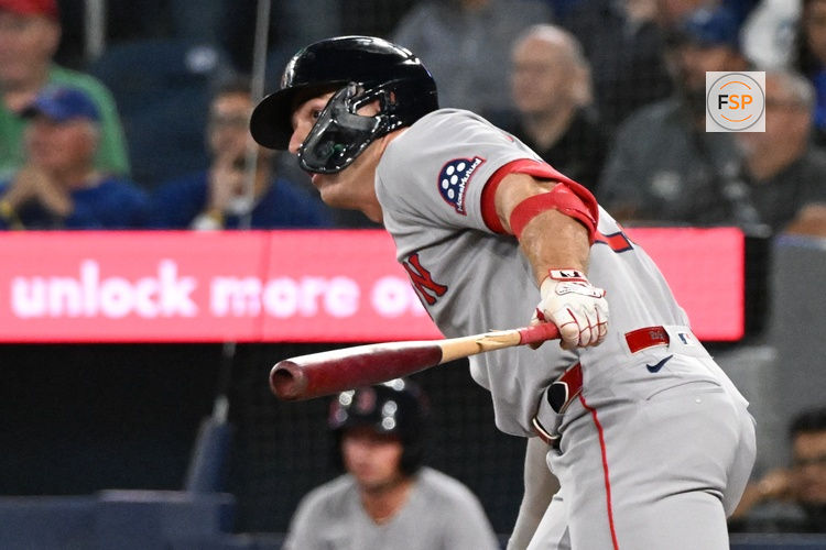 Sep 24, 2025; Toronto, Ontario, CAN;  Boston Red Sox second baseman Romy Gonzalez (23) hits a single against the Toronto Blue Jays in the first inning at Rogers Centre. Credit: Dan Hamilton-Imagn Images