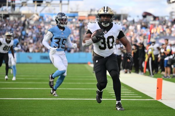 Dec 28, 2025; Nashville, Tennessee, USA;  New Orleans Saints running back Audric Estime (30) runs with the ball for a touchdown against the Tennessee Titans during the second half at Nissan Stadium. Mandatory Credit: Steve Roberts-Imagn Images