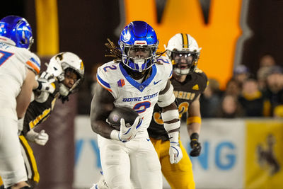 Nov 23, 2024; Laramie, Wyoming, USA; Boise State Broncos running back Ashton Jeanty (2) runs for a touchdown against the Wyoming Cowboys during the first quarter at Jonah Field at War Memorial Stadium. Mandatory Credit: Troy Babbitt-Imagn Images

