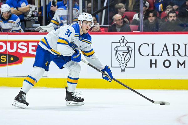 Dec 6, 2025; Ottawa, Ontario, CAN; St. Louis Blues left wing Dylan Holloway (81) plays the puck against the Ottawa Senators during the second period at Canadian Tire Centre. Mandatory Credit: David Kirouac-Imagn Images