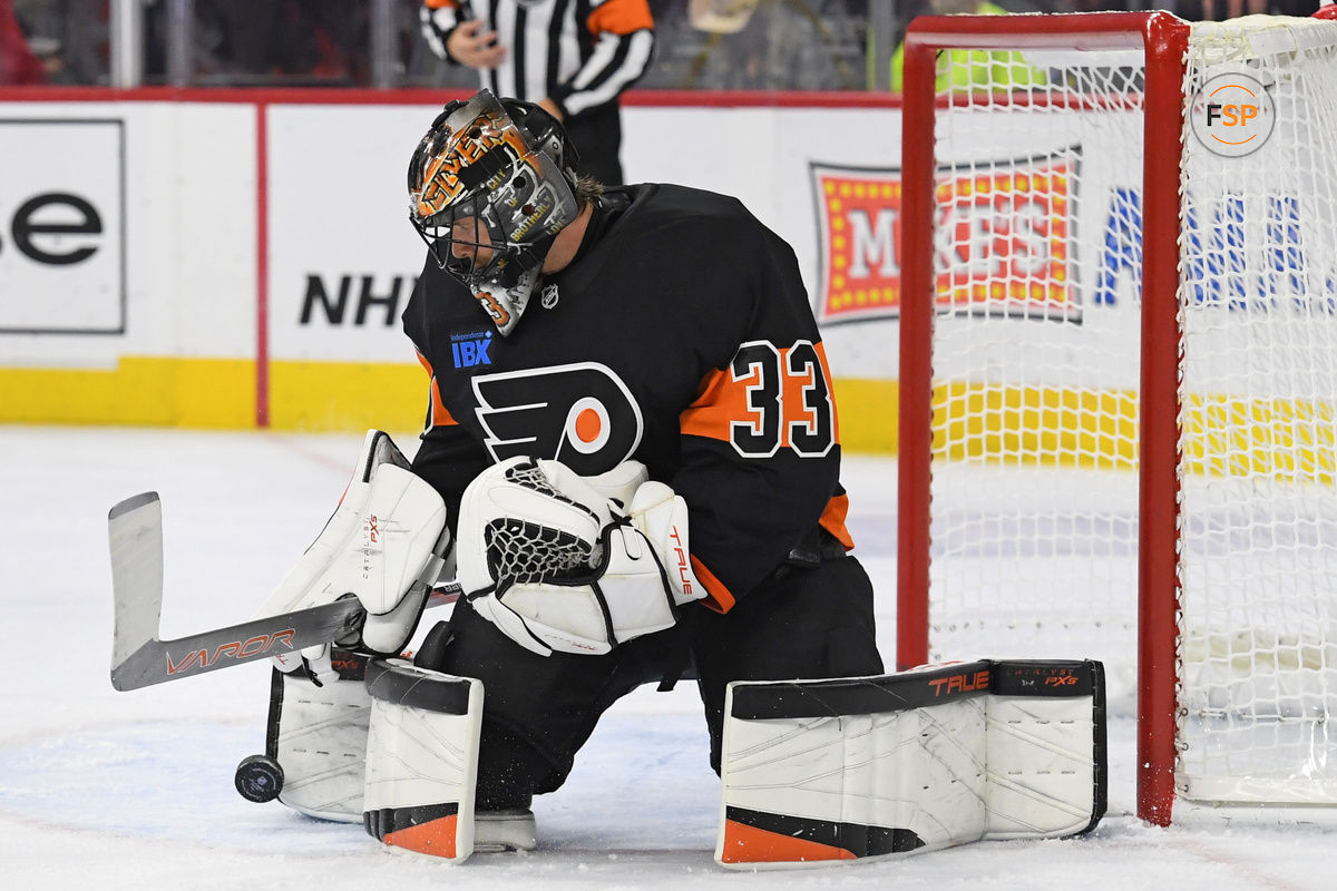 Oct 31, 2024; Philadelphia, Pennsylvania, USA; Philadelphia Flyers goaltender Samuel Ersson (33) makes a save against the St. Louis Blues during the second period at Wells Fargo Center. Credit: Eric Hartline-Imagn Images