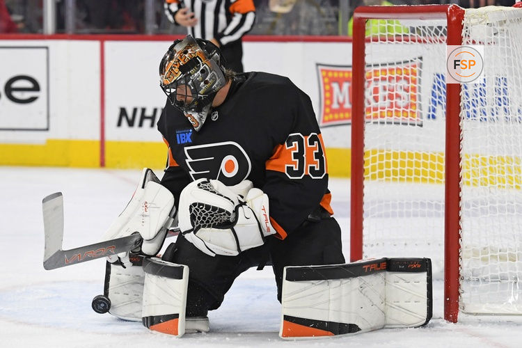 Oct 31, 2024; Philadelphia, Pennsylvania, USA; Philadelphia Flyers goaltender Samuel Ersson (33) makes a save against the St. Louis Blues during the second period at Wells Fargo Center. Credit: Eric Hartline-Imagn Images