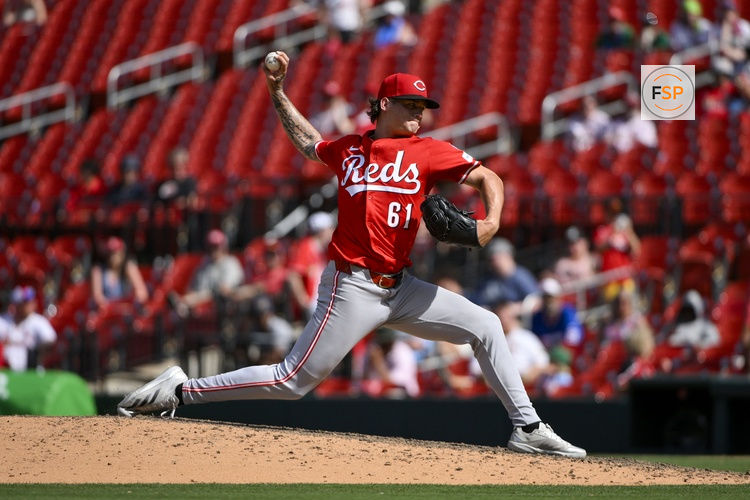 Jun 21, 2025; St. Louis, Missouri, USA;  Cincinnati Reds relief pitcher Chase Petty (61) pitches against the St. Louis Cardinals during the eleventh inning at Busch Stadium. Credit: Jeff Curry-Imagn Images