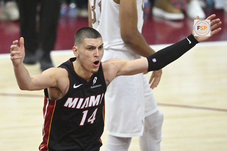 Apr 23, 2025; Cleveland, Ohio, USA; Miami Heat guard Tyler Herro (14) reacts in the third quarter of game two of the first round of the 2025 NBA Playoffs against the Cleveland Cavaliers at Rocket Arena. Credit: David Richard-Imagn Images