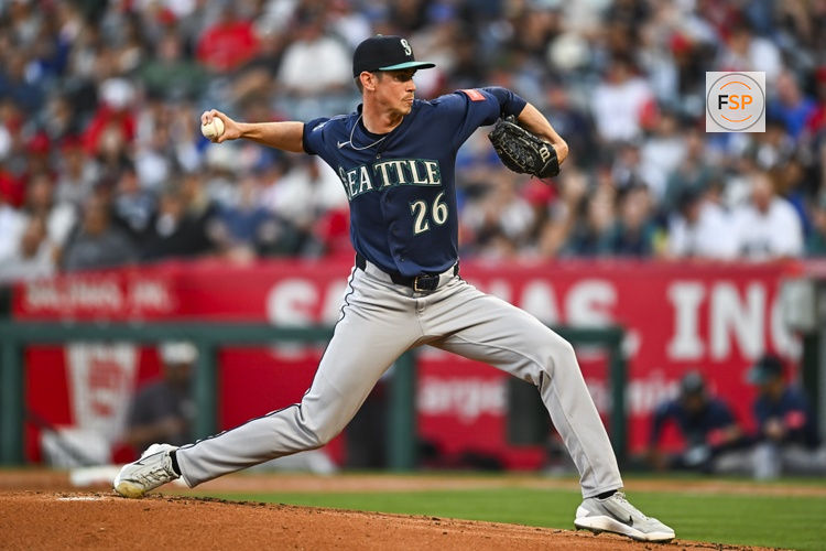 Apr 4, 2026; Anaheim, California, USA; Seattle Mariners starting pitcher Emerson Hancock (26) throws a pitch against the Los Angeles Angels during the first inning at Angel Stadium. Credit: Jonathan Hui-Imagn Images