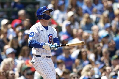 May 24, 2026; Chicago, Illinois, USA; Chicago Cubs center fielder Pete Crow-Armstrong (4) hits an RBI-sacrifice fly against the Houston Astros during the second inning at Wrigley Field. Mandatory Credit: Kamil Krzaczynski-Imagn Images