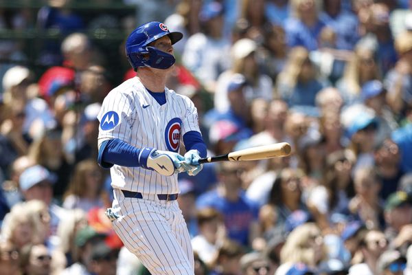 May 24, 2026; Chicago, Illinois, USA; Chicago Cubs center fielder Pete Crow-Armstrong (4) hits an RBI-sacrifice fly against the Houston Astros during the second inning at Wrigley Field. Mandatory Credit: Kamil Krzaczynski-Imagn Images