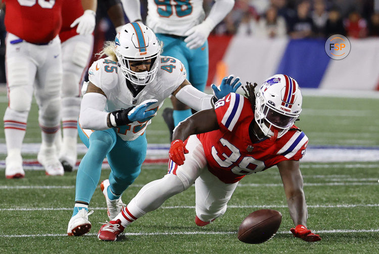 FOXBOROUGH, MA - SEPTEMBER 17: New England Patriots running back Rhamondre Stevenson (38) and Miami Dolphins linebacker Duke Riley (45) chase a fumble during a game between the New England Patriots and the Miami Dolphins on September 17, 2023, at Gillette Stadium in Foxborough, Massachusetts. (Photo by Fred Kfoury III/Icon Sportswire)