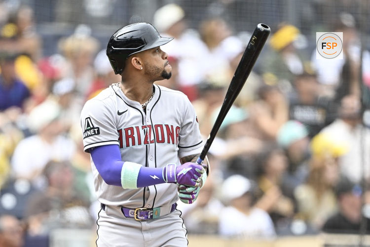 Sep 28, 2025; San Diego, California, USA; Arizona Diamondbacks second baseman Ketel Marte (4) hits a solo home run during the first inning against the San Diego Padres at Petco Park. Credit: Denis Poroy-Imagn Images