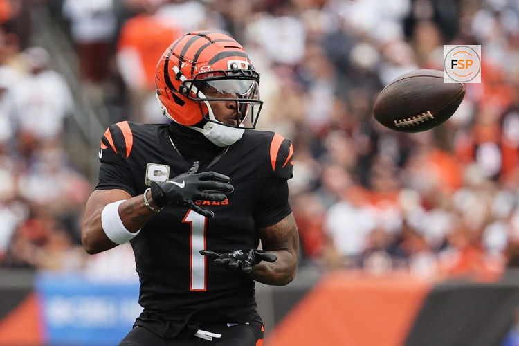 Nov 2, 2025; Cincinnati, Ohio, USA; Cincinnati Bengals wide receiver Ja'Marr Chase (1) catches a pass against the Chicago Bears during the second quarter at Paycor Stadium. Credit: Joseph Maiorana-Imagn Images
