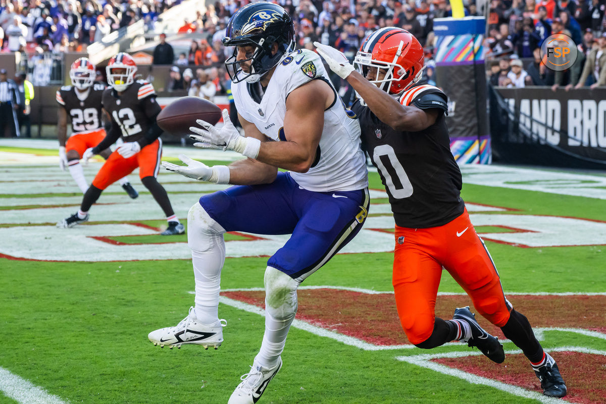 Oct 27, 2024; Cleveland, Ohio, USA; Baltimore Ravens tight end Mark Andrews (89) catches a pass for a touchdown as Cleveland Browns cornerback Greg Newsome II (0) defends during the second half at Huntington Bank Field. Credit: Ken Blaze-Imagn Images