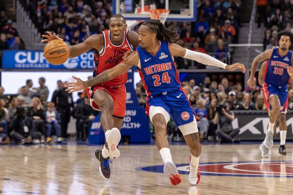 Jan 10, 2026; Detroit, Michigan, USA; Detroit Pistons guard Daniss Jenkins (24) defends against LA Clippers guard Kris Dunn (8) during the second half at Little Caesars Arena. Mandatory Credit: David Reginek-Imagn Images