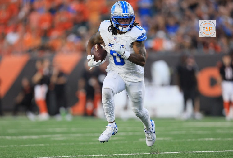 Oct 5, 2025; Cincinnati, Ohio, USA; Detroit Lions running back Jahmyr Gibbs (0) runs for a gain during the fourth quarter against the Cincinnati Bengals at Paycor Stadium. Credit: Katie Stratman-Imagn Images