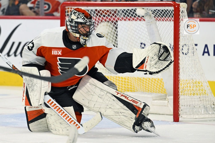 Apr 14, 2026; Philadelphia, Pennsylvania, USA; Philadelphia Flyers goaltender Samuel Ersson (33) makes a save against the Montréal Canadiens during the third period at Xfinity Mobile Arena. Credit: Eric Hartline-Imagn Images