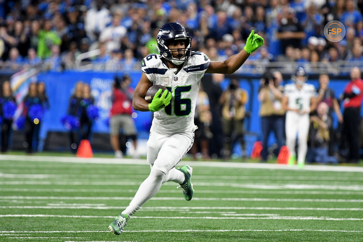 Sep 30, 2024; Detroit, Michigan, USA; Seattle Seahawks wide receiver Tyler Lockett (16) runs the ball against the Detroit Lions in the third quarter at Ford Field. Credit: Eamon Horwedel-Imagn Images