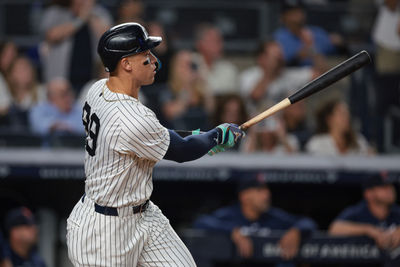 Sep 13, 2024; Bronx, New York, USA; New York Yankees center fielder Aaron Judge (99) looks up at his grand slam home run during the seventh inning against the Boston Red Sox at Yankee Stadium. Mandatory Credit: Vincent Carchietta-Imagn Images