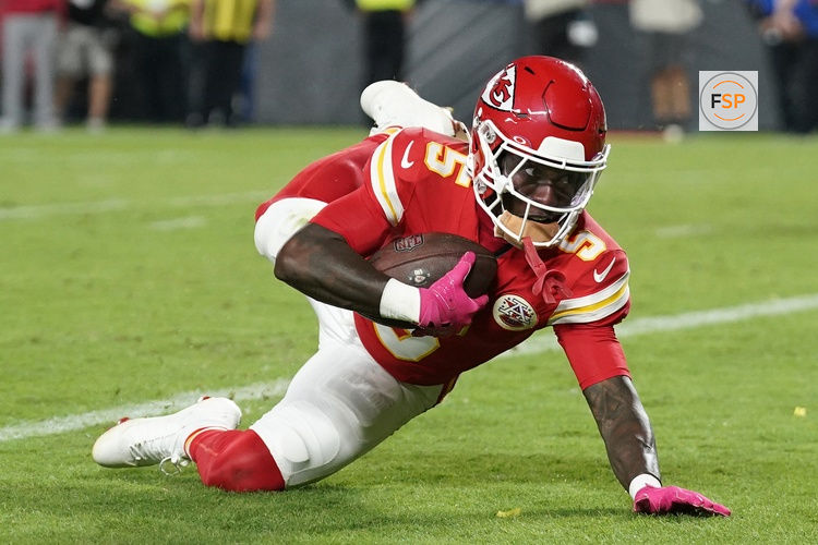 Oct 12, 2025; Kansas City, Missouri, USA; Kansas City Chiefs wide receiver Marquise Brown (5) makes a touchdown catch against the Detroit Lions during the second half at GEHA Field at Arrowhead Stadium. Credit: Denny Medley-Imagn Images