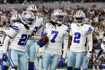 Nov 10, 2024; Arlington, Texas, USA; Dallas Cowboys cornerback Trevon Diggs (7) and his teammates react after an interception in the second quarter against the Philadelphia Eagles at AT&T Stadium. Mandatory Credit: Tim Heitman-Imagn Images