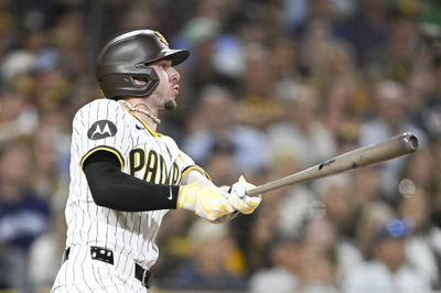 Aug 19, 2024; San Diego, California, USA; San Diego Padres center fielder Jackson Merrill (3) hits an RBI double during the third inning against the Minnesota Twins at Petco Park. Mandatory Credit: Denis Poroy-USA TODAY Sports