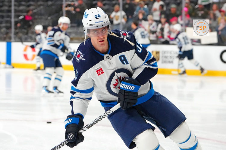 Apr 13, 2026; Las Vegas, Nevada, USA; Winnipeg Jets center Mark Scheifele (55) warms up before the start of a game against the Vegas Golden Knights at T-Mobile Arena. Credit: Stephen R. Sylvanie-Imagn Images