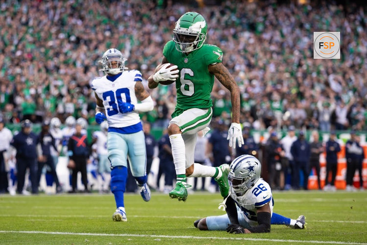 Dec 29, 2024; Philadelphia, Pennsylvania, USA; Philadelphia Eagles wide receiver DeVonta Smith (6) runs past Dallas Cowboys cornerback DaRon Bland (26) for a touchdown after a catch during the fourth quarter at Lincoln Financial Field. Credit: Bill Streicher-Imagn Images