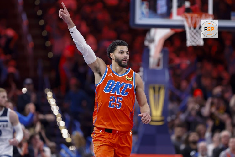 Nov 26, 2025; Oklahoma City, Oklahoma, USA; Oklahoma City Thunder guard Ajay Mitchell (25) gestures to his team during a play against the Minnesota Timberwolves during the second half at Paycom Center. Credit: Alonzo Adams-Imagn Images