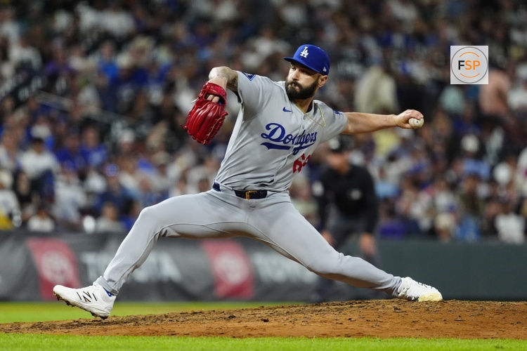 Jun 24, 2025; Denver, Colorado, USA; Los Angeles Dodgers relief pitcher Tanner Scott (66) delivers a pitch in the ninth inning against the Colorado Rockies at Coors Field. Credit: Ron Chenoy-Imagn Images
