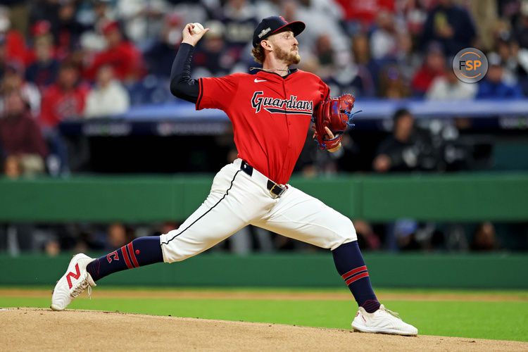 Oct 19, 2024; Cleveland, Ohio, USA; Cleveland Guardians pitcher Tanner Bibee (28) pitches during the first inning against the New York Yankees during game five of the ALCS for the 2024 MLB playoffs at Progressive Field. Credit: Scott Galvin-Imagn Images