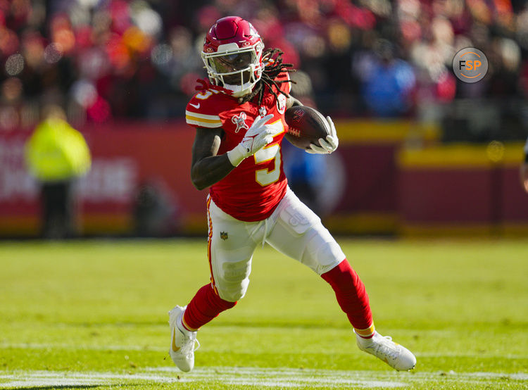 Dec 21, 2024; Kansas City, Missouri, USA; Kansas City Chiefs wide receiver Hollywood Brown (5) runs with the ball during the first half against the Houston Texans at GEHA Field at Arrowhead Stadium. Credit: Jay Biggerstaff-Imagn Images