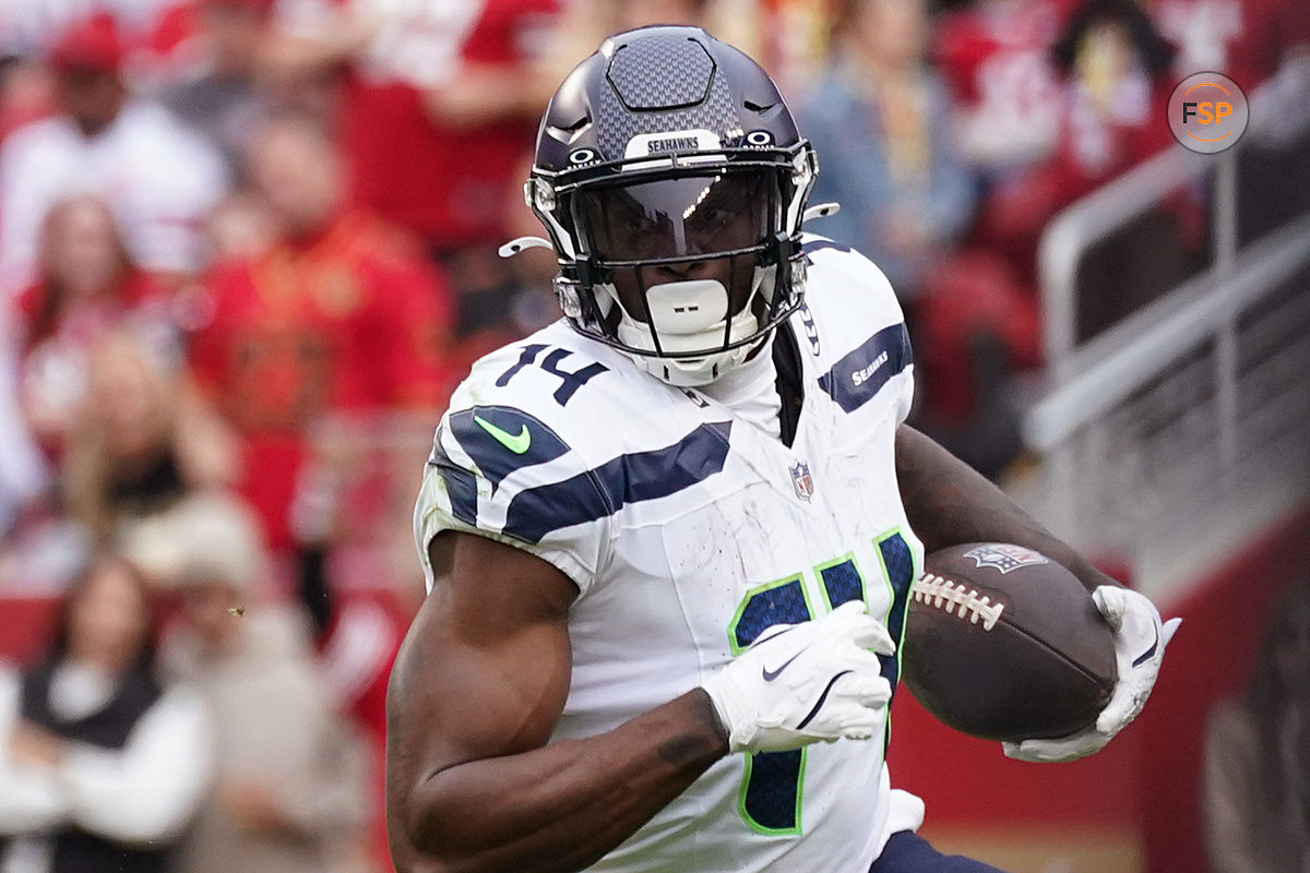 Nov 17, 2024; Santa Clara, California, USA; Seattle Seahawks wide receiver DK Metcalf (14) makes a reception against the San Francisco 49ers in the second quarter at Levi's Stadium. Credit: David Gonzales-Imagn Images