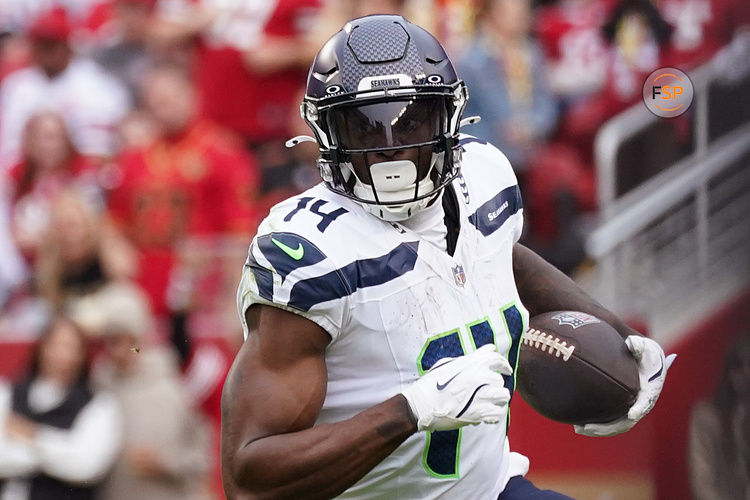 Nov 17, 2024; Santa Clara, California, USA; Seattle Seahawks wide receiver DK Metcalf (14) makes a reception against the San Francisco 49ers in the second quarter at Levi's Stadium. Credit: David Gonzales-Imagn Images