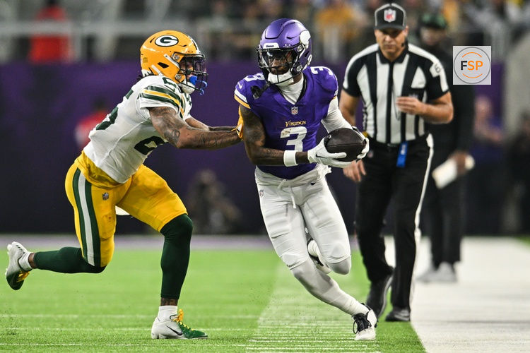 Dec 29, 2024; Minneapolis, Minnesota, USA; Minnesota Vikings wide receiver Jordan Addison (3) is knocked out of bounds by Green Bay Packers cornerback Keisean Nixon (25) during the second quarter at U.S. Bank Stadium. Credit: Jeffrey Becker-Imagn Images