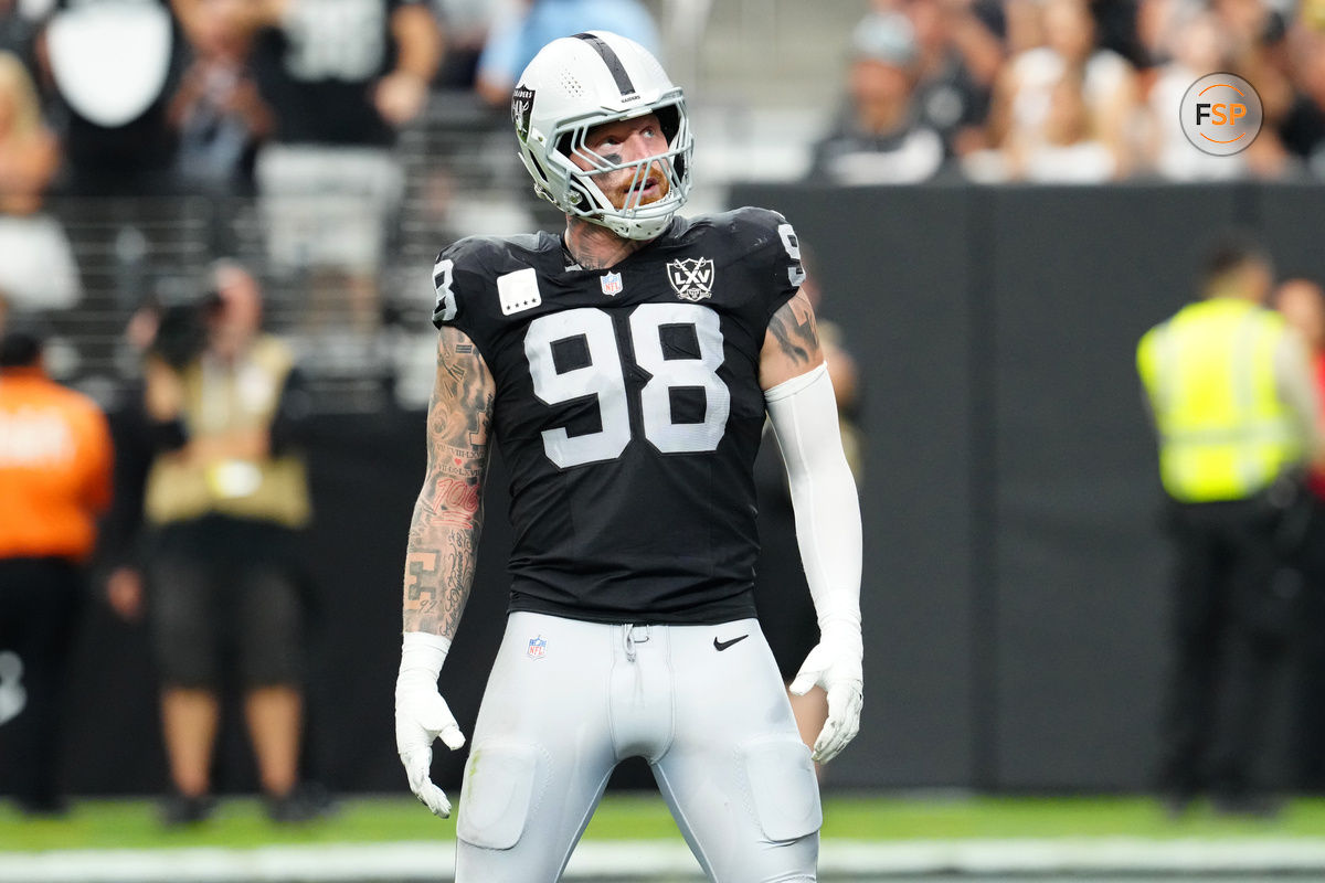 Sep 22, 2024; Paradise, Nevada, USA; Las Vegas Raiders defensive end Maxx Crosby (98) celebrates after getting a sack against the Carolina Panthers during the second quarter at Allegiant Stadium. Credit: Stephen R. Sylvanie-Imagn Images