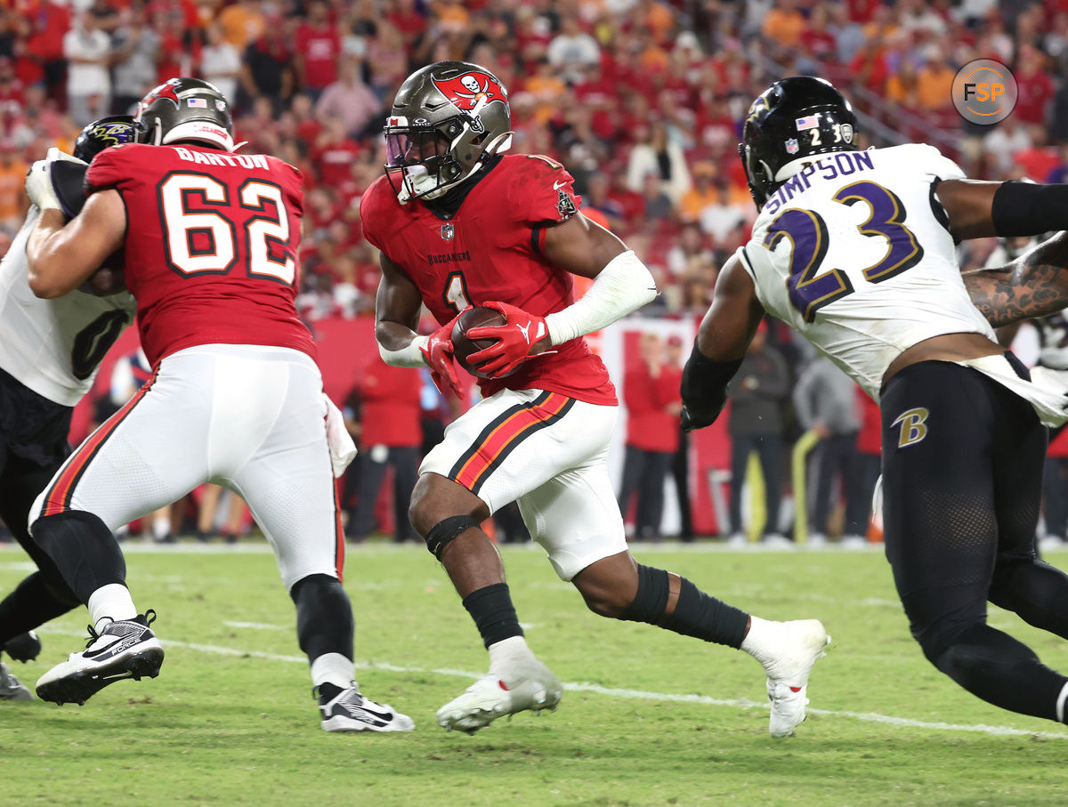 Oct 21, 2024; Tampa, Florida, USA; Tampa Bay Buccaneers running back Rachaad White (1) runs the ball for a touchdown against the Baltimore Ravens during the second half at Raymond James Stadium. Credit: Kim Klement Neitzel-Imagn Images