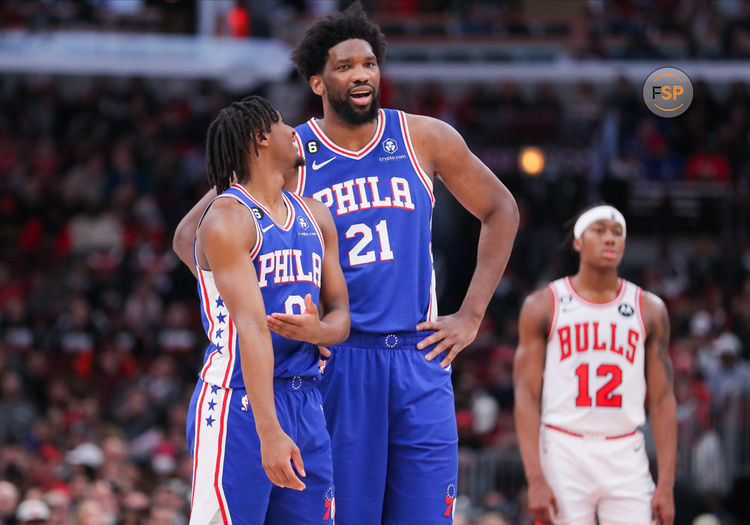 CHICAGO, IL - MARCH 22: Philadelphia 76ers guard Tyrese Maxey (0) and Philadelphia 76ers center Joel Embiid (21) chat during a NBA game between the Philadelphia 76ers and the Chicago Bulls on March 22, 2023 at the United Center in Chicago, IL. (Photo by Melissa Tamez/Icon Sportswire)