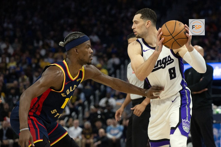 Mar 13, 2025; San Francisco, California, USA; Sacramento Kings guard Zach LaVine (8) looks to pass around Golden State Warriors forward Jimmy Butler III (10) during the second quarter at Chase Center. Credit: D. Ross Cameron-Imagn Images