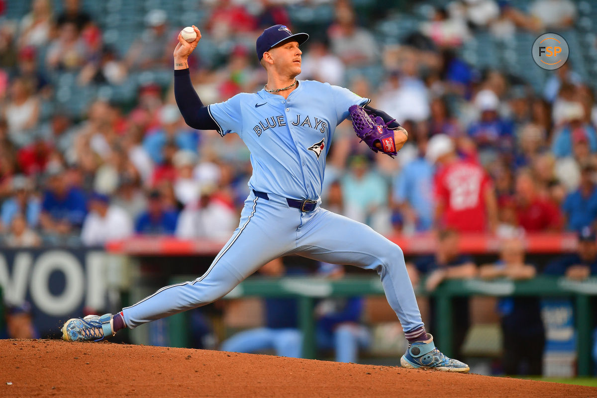 Aug 12, 2024; Anaheim, California, USA; Toronto Blue Jays pitcher Bowden Francis (44) throws against the Los Angeles Angels during the second inning at Angel Stadium. Credit: Gary A. Vasquez-USA TODAY Sports