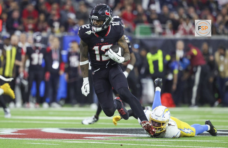 Jan 11, 2025; Houston, Texas, USA; Houston Texans wide receiver Nico Collins (12) runs with the ball after a reception during the game against the Los Angeles Chargers in an AFC wild card game at NRG Stadium. Credit: Troy Taormina-Imagn Images