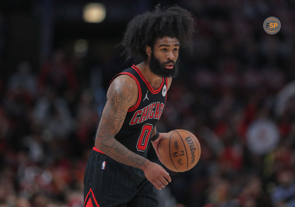 CHICAGO, IL - APRIL 17: Coby White #0 of the Chicago Bulls brings the ball up the court during the second half of the 2024 Play-In Tournament against the Atlanta Hawks at the United Center on April 17, 2024 in Chicago, Illinois.  (Photo by Mélissa Tamez/Icon Sportswire)