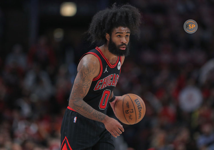 CHICAGO, IL - APRIL 17: Coby White #0 of the Chicago Bulls brings the ball up court during the second half of the 2024 Play-In Tournament against the Atlanta Hawks at the United Center on April 17, 2024 in Chicago, Illinois. (Photo by Melissa Tamez/Icon Sportswire)